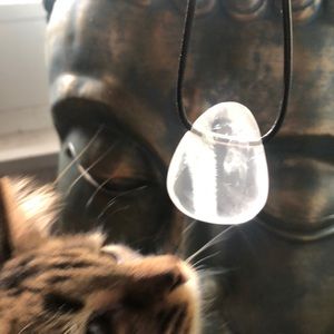 Clear quartz pendant on leather adjustable cord